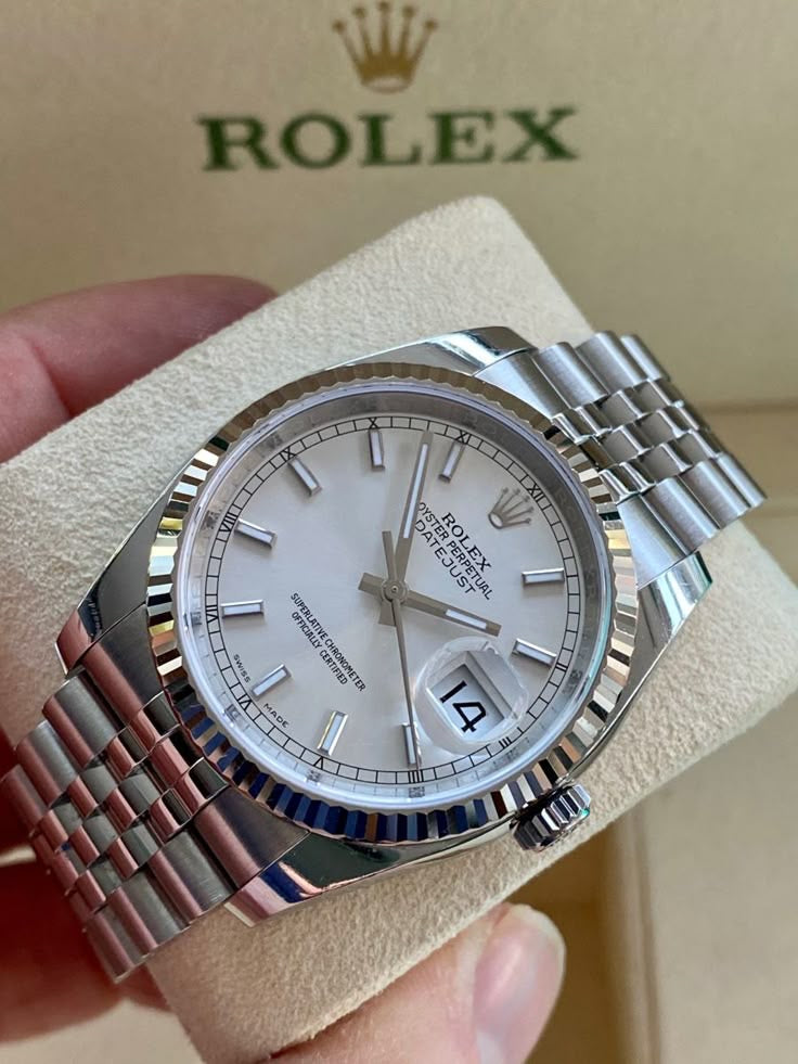 Montre rolex tableau blanc